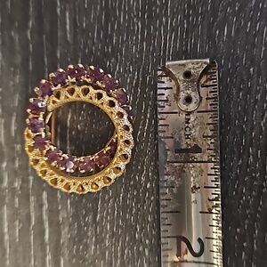 Amethyst and gold brooch